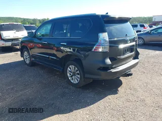 2014 Lexus GX with VIN JTJBM7FX1E5072455, listed as a IAAI auction lot 42133000 with 251,879 mi miles. Bid and sale history available at carsss.com. Image 3.