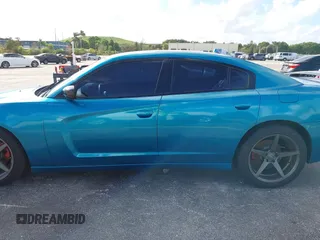 2012 Dodge Charger SXT with VIN 2C3CDXHG0CH185859, listed as a IAAI auction lot 40816799 with 132,572 mi miles. Bid and sale history available at carsss.com. Image 14.