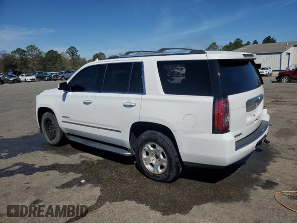 2015 GMC Yukon Denali with VIN 1GKS1CKJ9FR566390, listed as a Copart auction lot 48472835 with 167,719 mi miles and Salvage Title. Bid and sale history available at carsss.com. Image 2.