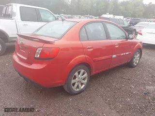 2011 Kia Rio LX with VIN KNADH4A33B6714471, listed as a IAAI auction lot 41970737 with 188,214 mi miles. Bid and sale history available at carsss.com. Image 4.