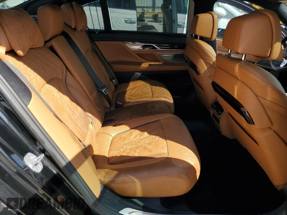 2022 BMW 7 Series 750i xDrive with VIN WBA7U2C01NCK83702, listed as a Copart auction lot 74327704 with Not provided miles and Salvage title. Bid and sale history available at DreamBid. Image 10.