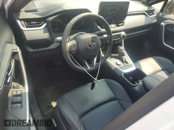 2023 Toyota RAV4 Hybrid XSE with VIN JTME6RFV7PD542467, listed as a Copart auction lot 59144595 with 18,943 mi miles and Salvage title. Bid and sale history available at DreamBid. Image 8.
