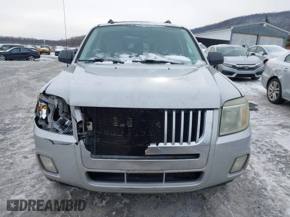 2008 Mercury Mariner z VIN 4M2CU81Z98KJ46467, wystawiony jako IAAI lot #41303575 z przebiegiem 207 949 mil mil oraz . Historia ofert i sprzedaży dostępna na DreamBid. Obrazek 13.