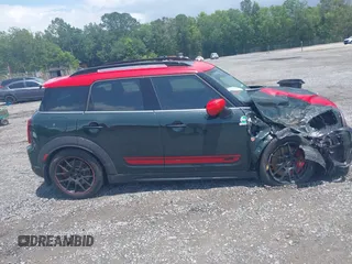 2023 MINI Countryman John Cooper Works z VIN WMZ33BS09P3R00627, wystawiony jako IAAI lot #42419212 z przebiegiem 12 260 mil mil oraz . Historia ofert i sprzedaży dostępna na DreamBid. Obrazek 13.
