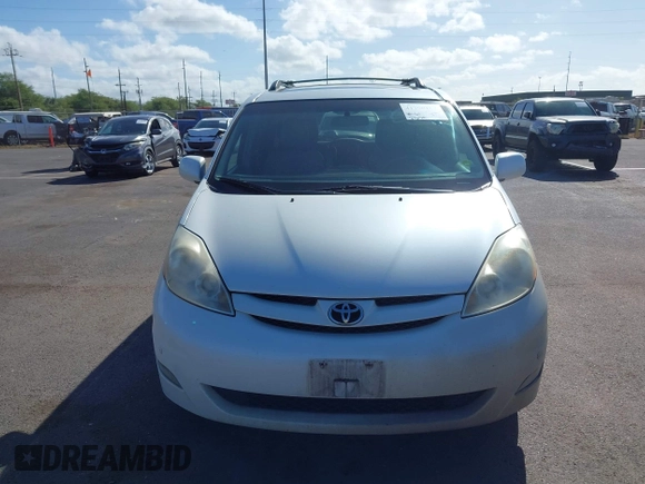2010 Toyota Sienna XLE with VIN 5TDYK4CC3AS336590, listed as a IAAI auction lot 41798194 with 230,707 mi miles. Bid and sale history available at carsss.com. Image 12.