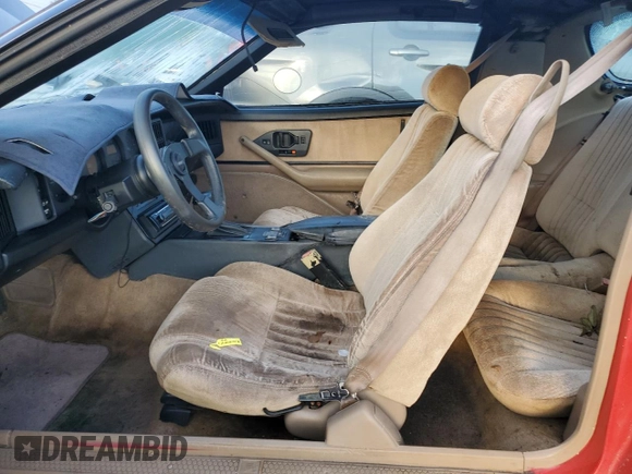 1992 Pontiac Firebird z VIN 1G2FS23T0NL203325, wystawiony jako Copart lot #76359414 z przebiegiem 198 651 mil mil oraz Nie do naprawy • Non repairable. Historia ofert i sprzedaży dostępna na DreamBid. Obrazek 7.