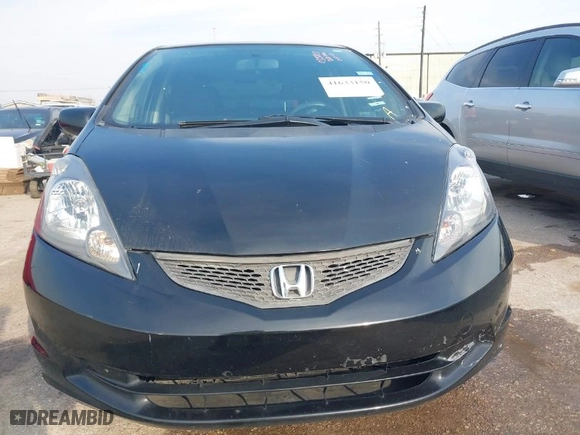 2013 Honda Fit with VIN JHMGE8H35DC035813, listed as a IAAI auction lot 41633150 with 104,623 mi miles. Bid and sale history available at carsss.com. Image 6.