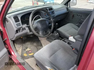 1998 Nissan Frontier XE z VIN 1N6DD26SXWC362674, wystawiony jako Copart lot #48180145 z przebiegiem 167 333 mil mil oraz Szkoda całkowita • Salvage title. Historia ofert i sprzedaży dostępna na DreamBid. Obrazek 8.