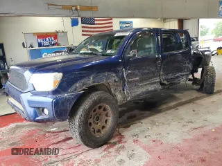 2015 Toyota Tacoma with VIN 3TMLU4EN9FM193140, listed as a Copart auction lot 62659065 with 134,935 mi miles and Salvage title. Bid and sale history available at DreamBid. Image 1.