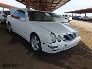 2001 Mercedes-Benz E-Class with VIN WDBJF65J61B183965, listed as a IAAI auction lot 41926279 with 305,436 mi miles. Bid and sale history available at carsss.com. Image 1.
