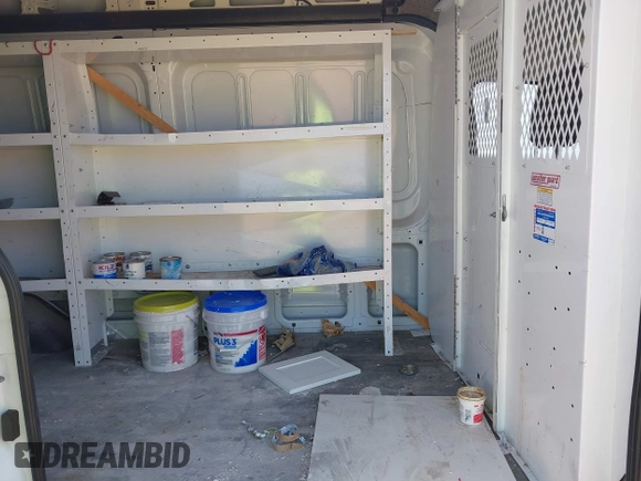 2021 Ford Transit Cargo z VIN 1FTBW3X88MKA42155, wystawiony jako IAAI lot #41988889 z przebiegiem 74 643 mil mil oraz . Historia ofert i sprzedaży dostępna na DreamBid. Obrazek 8.