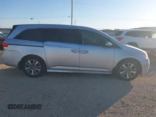 2014 Honda Odyssey Touring with VIN 5FNRL5H97EB094353, listed as a IAAI auction lot 41701712 with 141,228 mi miles and . Bid and sale history available at DreamBid. Image 14.