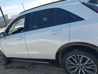 2024 Cadillac XT4 FWD Sport with VIN 1GYFZER43RF133293, listed as a IAAI auction lot 42055906 with 25,398 mi miles and . Bid and sale history available at DreamBid. Image 14.