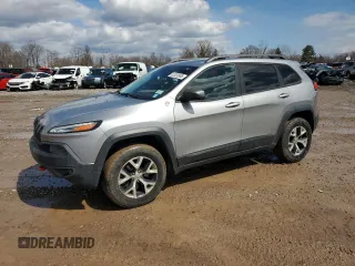 2014 Jeep Cherokee Trailhawk z VIN 1C4PJMBS0EW111508, wystawiony jako Copart lot #52320905 z przebiegiem 128 449 mil mil oraz Szkoda całkowita • Salvage title. Historia ofert i sprzedaży dostępna na DreamBid. Obrazek 1.