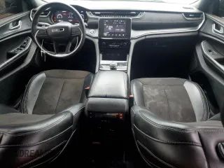 2023 Jeep Grand Cherokee Laredo with VIN 1C4RJKAG9P8829088, listed as a Copart auction lot 60099345 with 83,319 mi miles and Salvage title. Bid and sale history available at DreamBid. Image 8.