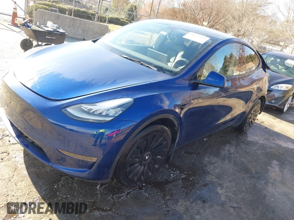 2023 Tesla Model Y Long Range with VIN 7SAYGDEE4PA042757, listed as a IAAI auction lot 41652541 with 48,569 mi miles. Bid and sale history available at carsss.com. Image 2.