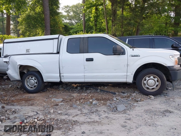 2020 Ford F-150 XL with VIN 1FTEX1CP7LKD41159, listed as a IAAI auction lot 42318766 with 144,173 mi miles and . Bid and sale history available at DreamBid. Image 13.