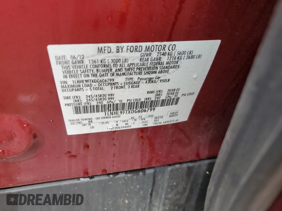 2013 Lincoln MKS EcoBoost with VIN 1LNHL9FTXDG606799, listed as a Copart auction lot 57469995 with 80,168 mi miles and Salvage title. Bid and sale history available at DreamBid. Image 13.