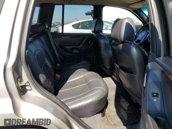 2001 Jeep Grand Cherokee Limited with VIN 1J4GW58S61C565685, listed as a Copart auction lot 73168374 with 252,978 mi miles and Clean Title. Bid and sale history available at carsss.com. Image 11.