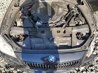 2014 BMW 6 Series 650i xDrive z VIN WBA6B4C54ED371520, wystawiony jako Copart lot #75107784 z przebiegiem 136 077 mil mil oraz Szkoda całkowita • Salvage title. Historia ofert i sprzedaży dostępna na DreamBid. Obrazek 11.