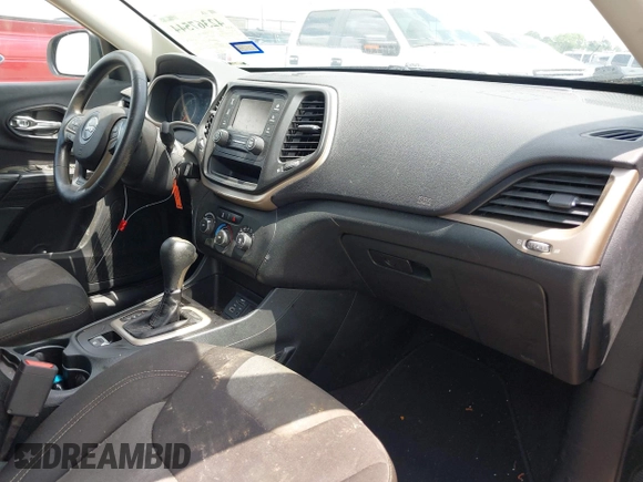 2016 Jeep Cherokee Sport with VIN 1C4PJLAB5GW297349, listed as a IAAI auction lot 42367544 with 142,930 mi miles and . Bid and sale history available at DreamBid. Image 5.
