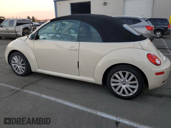 2009 Volkswagen Beetle S with VIN 3VWRF31Y29M409328, listed as a Copart auction lot 87849455 with 69,693 mi miles and Salvage title. Bid and sale history available at DreamBid. Image 2.