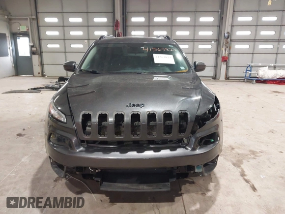 2016 Jeep Cherokee Latitude with VIN 1C4PJLCSXGW137190, listed as a IAAI auction lot 41563823 with 159,586 mi miles. Bid and sale history available at carsss.com. Image 13.