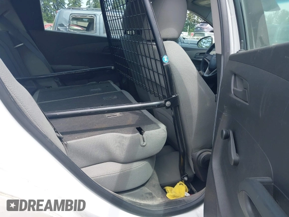 2015 Chevrolet Sonic LS with VIN 1G1JA6SHXF4134063, listed as a IAAI auction lot 42520887 with 221,364 mi miles and . Bid and sale history available at DreamBid. Image 8.