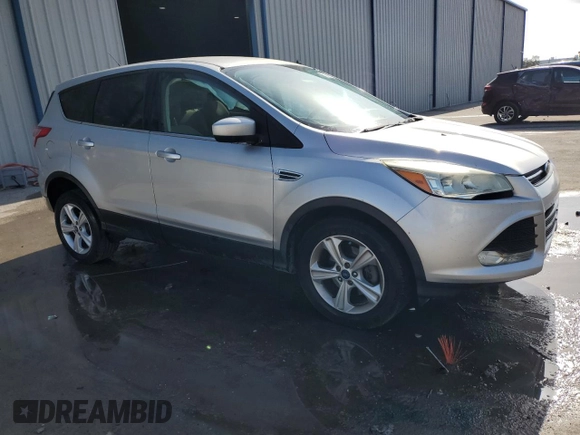 2015 Ford Escape SE with VIN 1FMCU0GX5FUA12226, listed as a Copart auction lot 52609965 with 123,919 mi miles and Salvage Title. Bid and sale history available at carsss.com. Image 4.