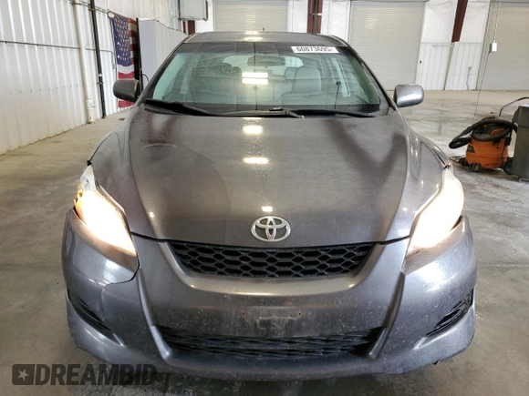 2009 Toyota Matrix S with VIN 2T1LE40E79C011596, listed as a Copart auction lot 60873695 with 207,692 mi miles and Salvage title. Bid and sale history available at DreamBid. Image 5.