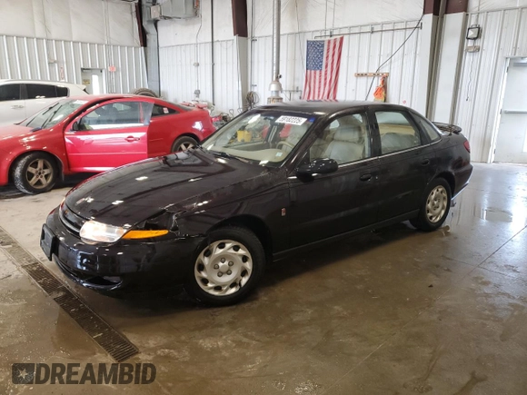 2000 Saturn LS z VIN 1G8JU52FXYY601270, wystawiony jako Copart lot #59182225 z przebiegiem 262 220 mil mil oraz Nie do naprawy • Non repairable. Historia ofert i sprzedaży dostępna na DreamBid. Obrazek 1.