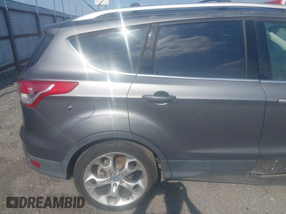 2013 Ford Escape Titanium with VIN 1FMCU0J92DUB36428, listed as a IAAI auction lot 42144682 with 263,600 mi miles and . Bid and sale history available at carsss.com. Image 17.