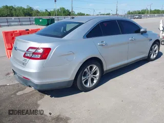2013 Ford Taurus SEL with VIN 1FAHP2E81DG129229, listed as a IAAI auction lot 41999326 with 205,856 mi miles. Bid and sale history available at carsss.com. Image 4.