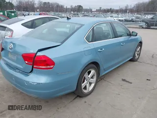 2013 Volkswagen Passat SE w/Sunroof with VIN 1VWBH7A3XDC083442, listed as a IAAI auction lot 41529678 with 138,825 mi miles. Bid and sale history available at carsss.com. Image 4.