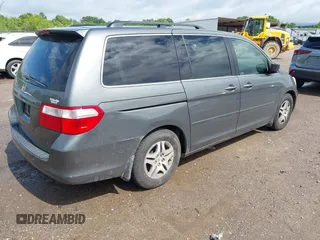 2007 Honda Odyssey EX z VIN 5FNRL38477B406473, wystawiony jako IAAI lot #42364081 z przebiegiem 214 511 mil mil oraz . Historia ofert i sprzedaży dostępna na DreamBid. Obrazek 4.