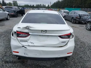 2017 Mazda 6 Grand Touring with VIN JM1GL1X51H1142473, listed as a IAAI auction lot 42234809 with 101,633 mi miles and . Bid and sale history available at DreamBid. Image 17.