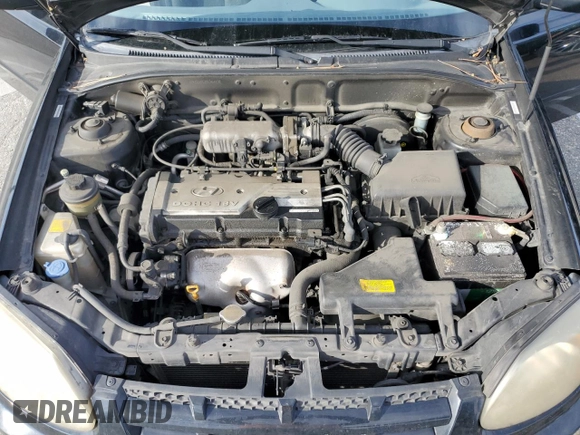2005 Hyundai Accent GLS z VIN KMHCG35C35U364132, wystawiony jako Copart lot #47227385 z przebiegiem 177 143 mil mil oraz Szkoda całkowita • Salvage title. Historia ofert i sprzedaży dostępna na DreamBid. Obrazek 11.