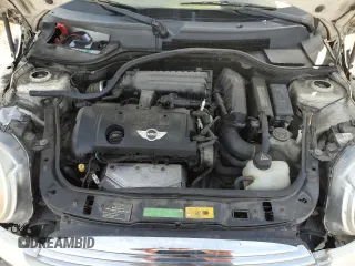 2010 MINI Hardtop with VIN WMWMF3C52ATZ65593, listed as a Copart auction lot 50107445 with 105,389 mi miles and Salvage title. Bid and sale history available at DreamBid. Image 11.