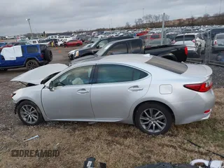 2016 Lexus ES 300h z VIN JTHBW1GGXG2109451, wystawiony jako IAAI lot #41168128 z przebiegiem 101 603 mil mil oraz . Historia ofert i sprzedaży dostępna na DreamBid. Obrazek 14.