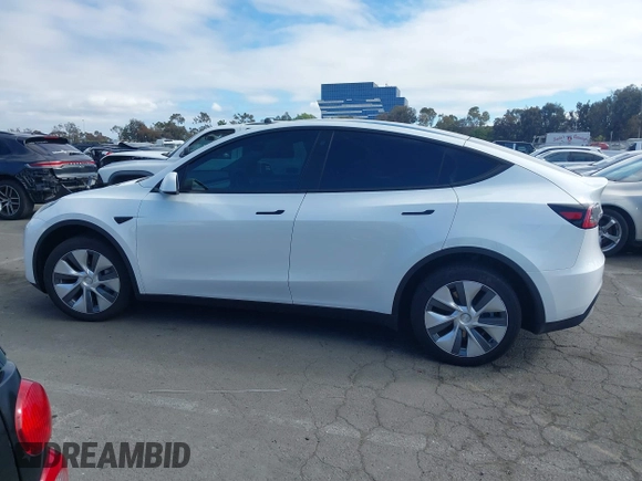 2023 Tesla Model Y Long Range with VIN 7SAYGDEE9PA094191, listed as a IAAI auction lot 41906319 with 15,240 mi miles and . Bid and sale history available at DreamBid. Image 15.