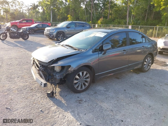 2010 Honda Civic Sdn EX with VIN 19XFA1F80AE026715, listed as a IAAI auction lot 41887154 with 128,272 mi miles. Bid and sale history available at carsss.com. Image 2.