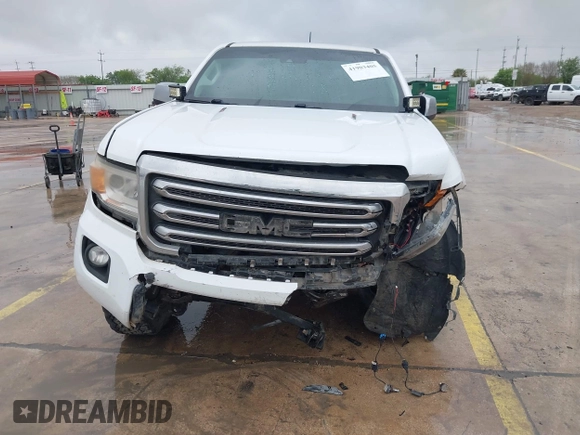 2018 GMC Canyon 4WD SLT with VIN 1GTP6DE18J1111056, listed as a IAAI auction lot 41903405 with 99,280 mi miles. Bid and sale history available at carsss.com. Image 12.