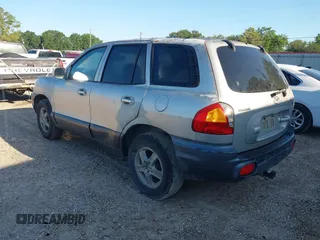 2003 Hyundai Santa Fe GLS z VIN KM8SC13E93U541750, wystawiony jako IAAI lot #42200817 z przebiegiem 174 842 mil mil oraz . Historia ofert i sprzedaży dostępna na DreamBid. Obrazek 3.