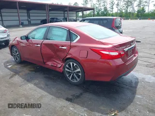 2016 Nissan Altima SL with VIN 1N4AL3AP1GC264898, listed as a IAAI auction lot 42093306 with 115,429 mi miles and . Bid and sale history available at carsss.com. Image 3.