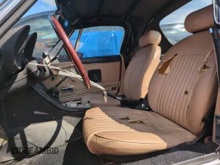 1978 Alfa Romeo Spider z VIN AR115410004488, wystawiony jako Copart lot #74726184 z przebiegiem 50 872 mil mil oraz Szkody całkowita. Historia ofert i sprzedaży dostępna na DreamBid. Obrazek 7.