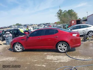 2012 Kia Optima EX with VIN 5XXGN4A72CG043809, listed as a IAAI auction lot 41920663 with 273,509 mi miles. Bid and sale history available at carsss.com. Image 14.
