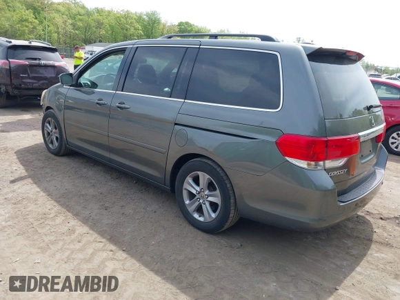 2008 Honda Odyssey Touring with VIN 5FNRL38908B100051, listed as a IAAI auction lot 42110484 with 190,567 mi miles and . Bid and sale history available at DreamBid. Image 3.