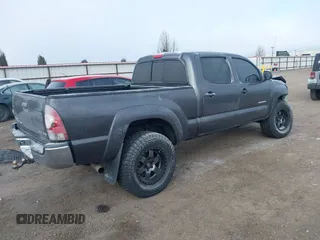 2015 Toyota Tacoma with VIN 3TMMU4FN0FM085444, listed as a IAAI auction lot 41388229 with 139,802 mi miles and . Bid and sale history available at DreamBid. Image 4.