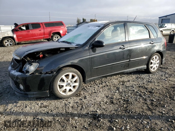 2005 Kia Spectra with VIN KNAFE161655093051, listed as a Copart auction lot 77821904 with 104,874 mi miles and Salvage Title. Bid and sale history available at carsss.com. Image 1.