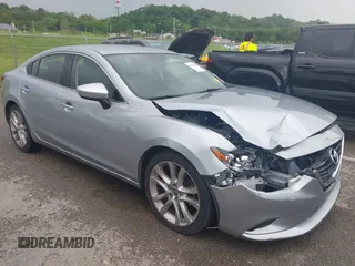 2016 Mazda 6 i Touring with VIN JM1GJ1V57G1434250, listed as a IAAI auction lot 42241857 with 68,011 mi miles and . Bid and sale history available at DreamBid. Image 1.